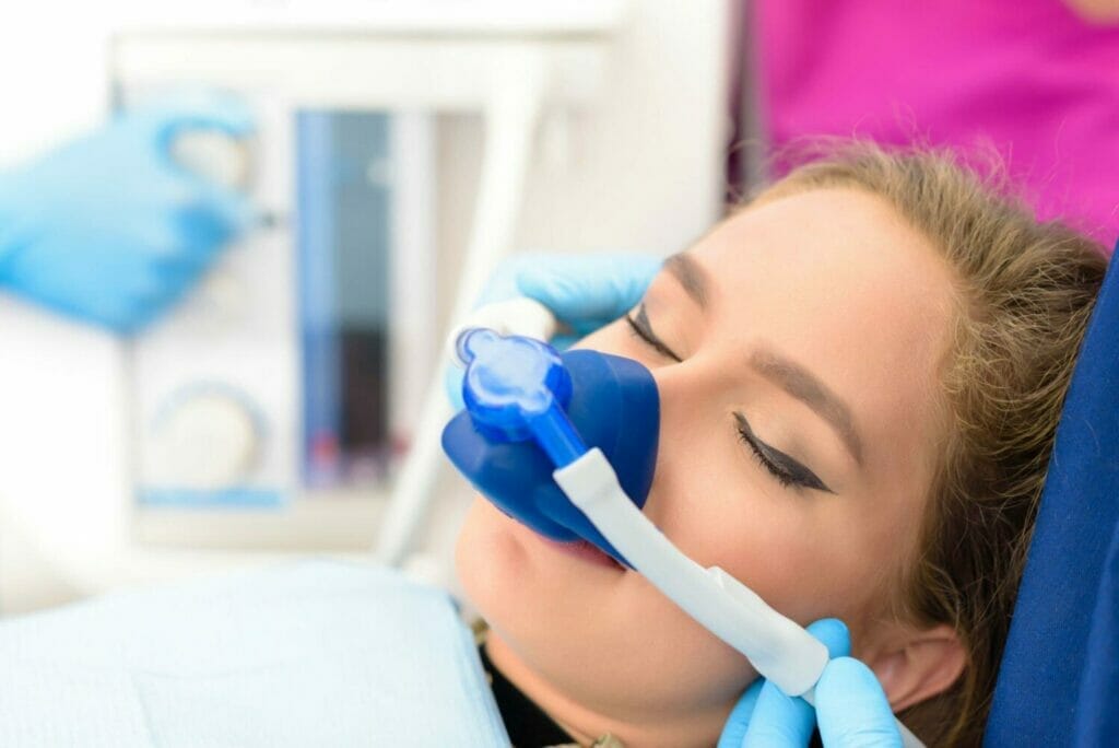 woman being sedated with nitrous oxide